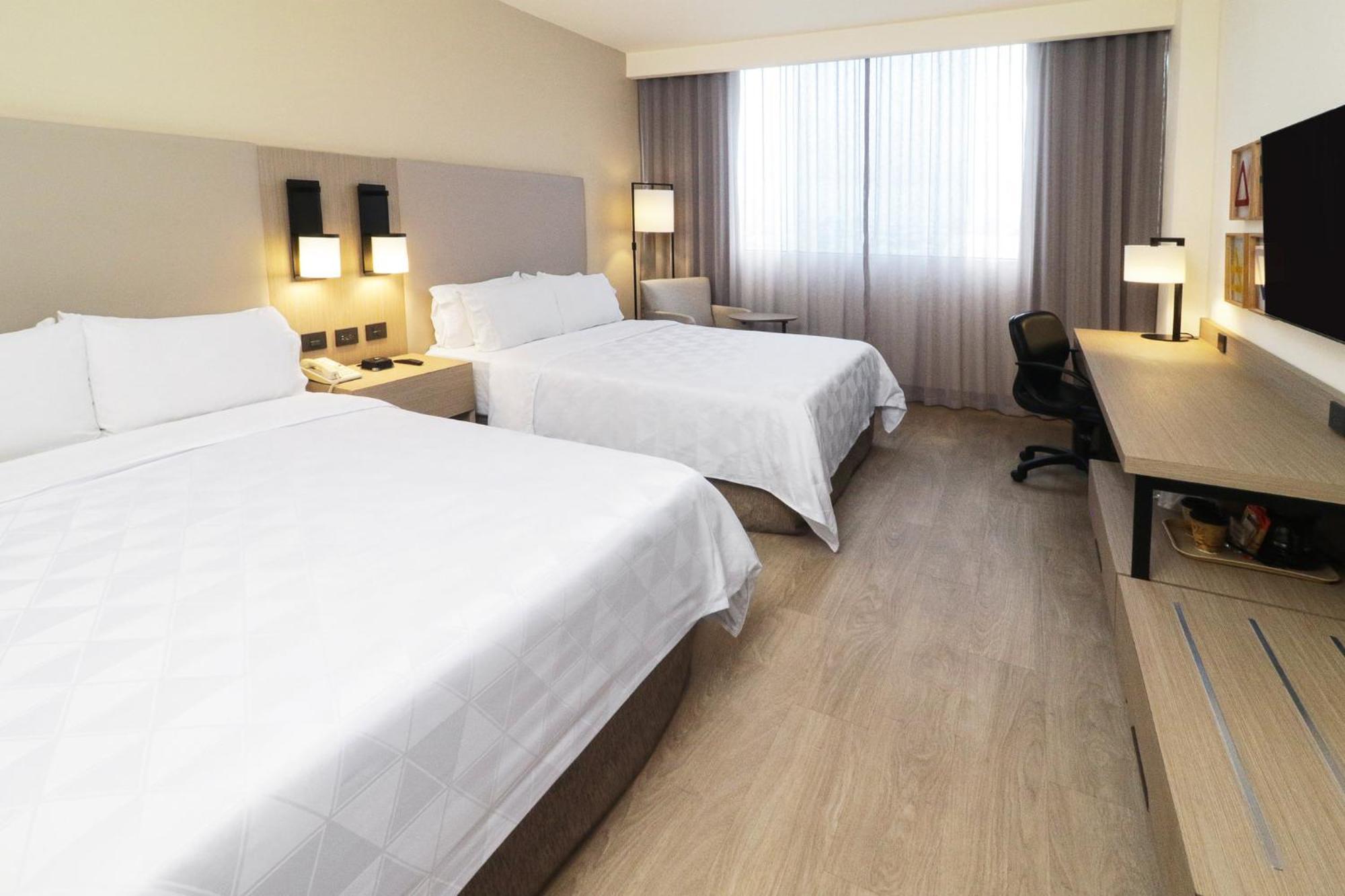 Holiday Inn Monterrey-Parque Fundidora By Ihg Dış mekan fotoğraf A room at the hotel